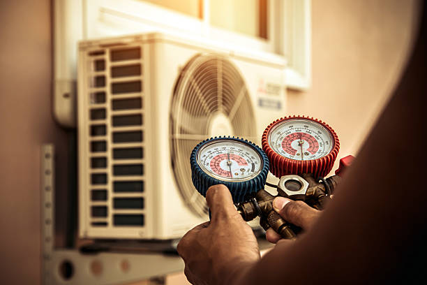 Professional Air Conditioning Service technician working in Yarnell, AZ